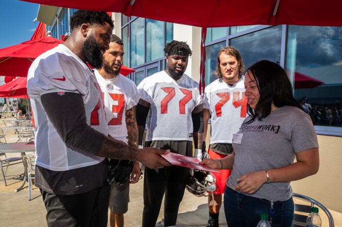 Donovan Smith, Mike Evans, Caleb Benenoch and Ali Marpet with Khadijah Lee.